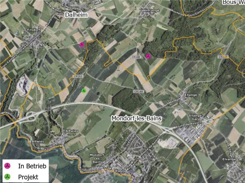 Grüner Punkt markiert geplanten Mondorfer Windpark-Standort, violette Punkte zeigen bestehende Windanlagen in Dalheim.