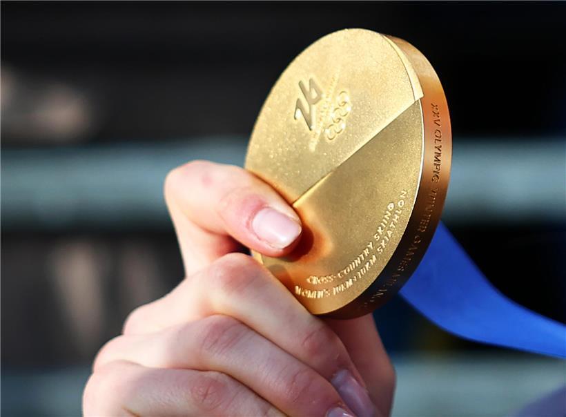 Italienische Athleten bei den Olympischen Winterspielen feiern Erfolge als Gastgeber nation