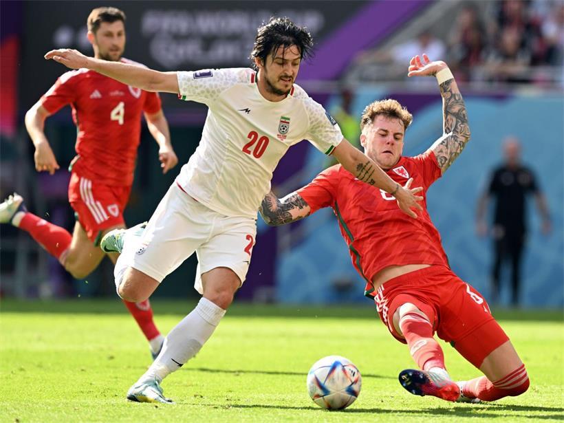 Iranische Fußball-Nationalmannschaft beim WM-Start nach monatelangen Diskussionen am Dienstag auf dem Spielfeld