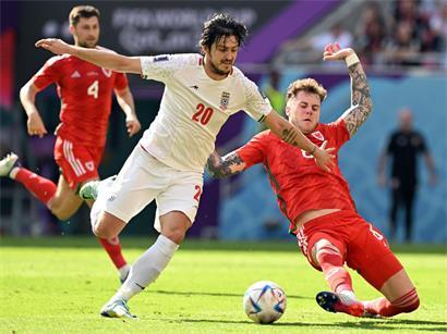 Iranische Fußball-Nationalmannschaft beim WM-Start nach monatelangen Diskussionen am Dienstag auf dem Spielfeld