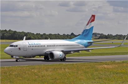 Luxair Boeing Flugzeug landet am Donnerstagnachmittag in Luxemburg nach Rückflug aus dem Oman