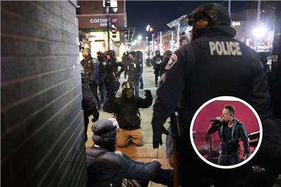 Einsatzkräfte nehmen Demonstranten bei unerlaubter Lärm-Demonstration in Minneapolis fest, Protest und Polizei im Einsatz