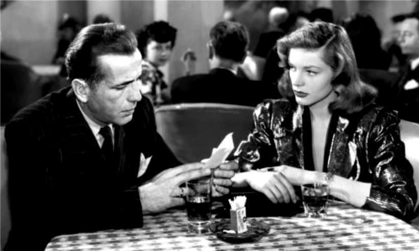 Humphrey Bogart und Lauren Bacall in einer Filmszene aus dem Klassiker „The Big Sleep“ von 1946