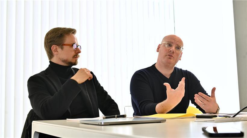 Me Thierry Hirsch und Me Maximilien Lehnen, zwei Anwälte in formeller Kleidung vor neutralem Hintergrund